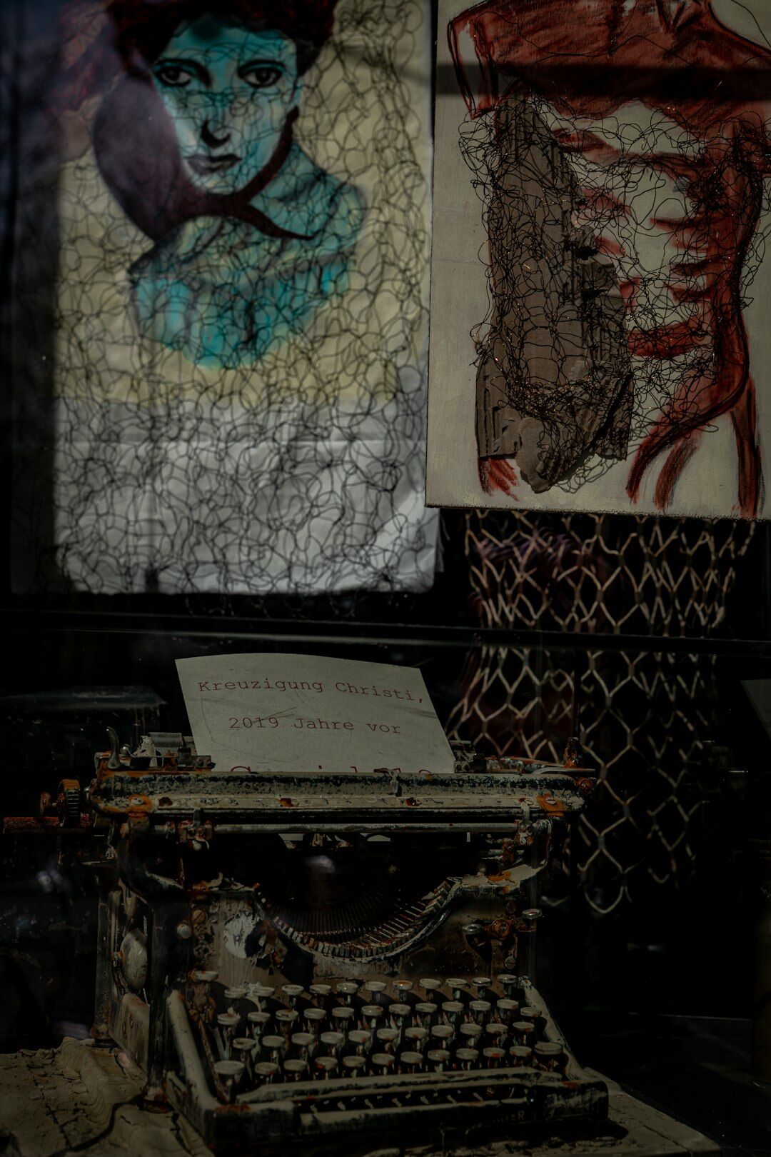 Antique typewriter with fashion sketches and film negatives