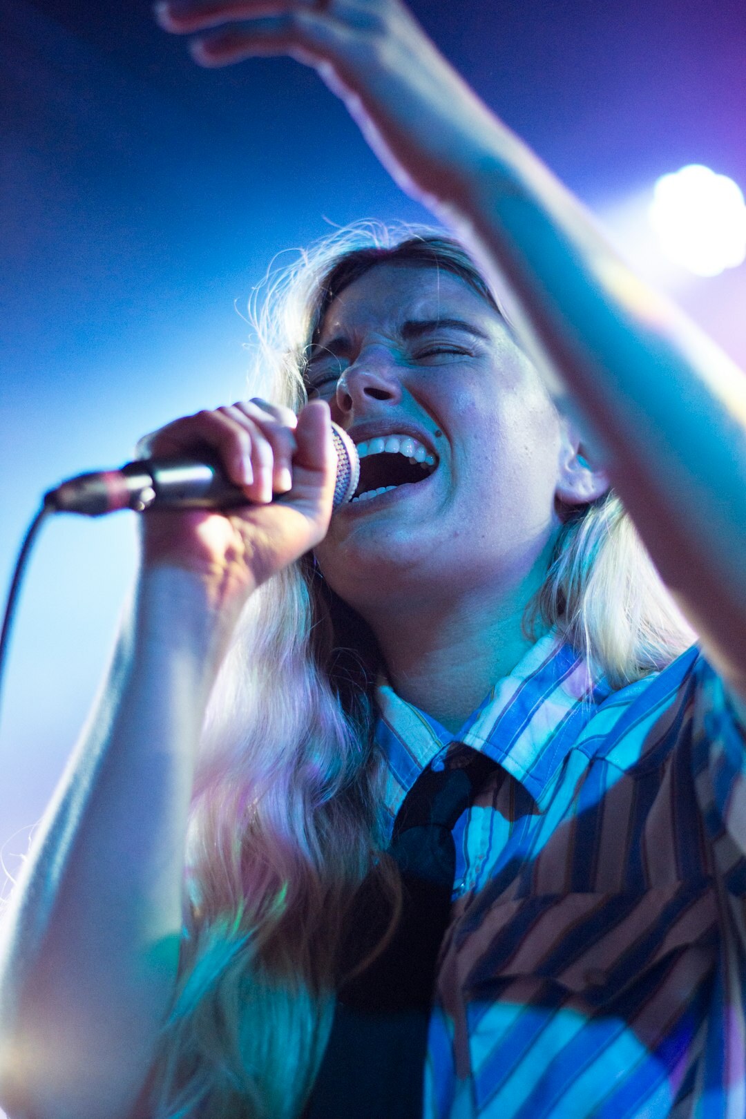 singer performing on stage